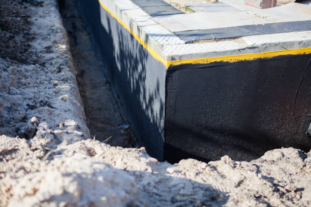 Professional Waterproofing technician working in Carrollton, VA